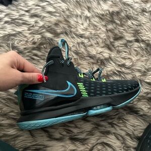 Nike Black Sneakers with Blue Laces